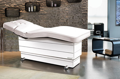 Versus electrically operated massage table